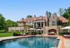 Old Westbury Mansion, exterior of Spring Hill Lane estate with a giant in-ground pool