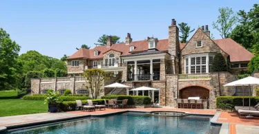 Old Westbury Mansion, exterior of Spring Hill Lane estate with a giant in-ground pool