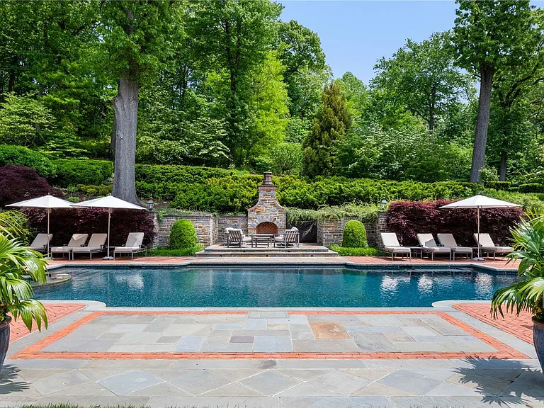 Old Westbury Mansion, exterior of Spring Hill Lane estate with in-ground pool