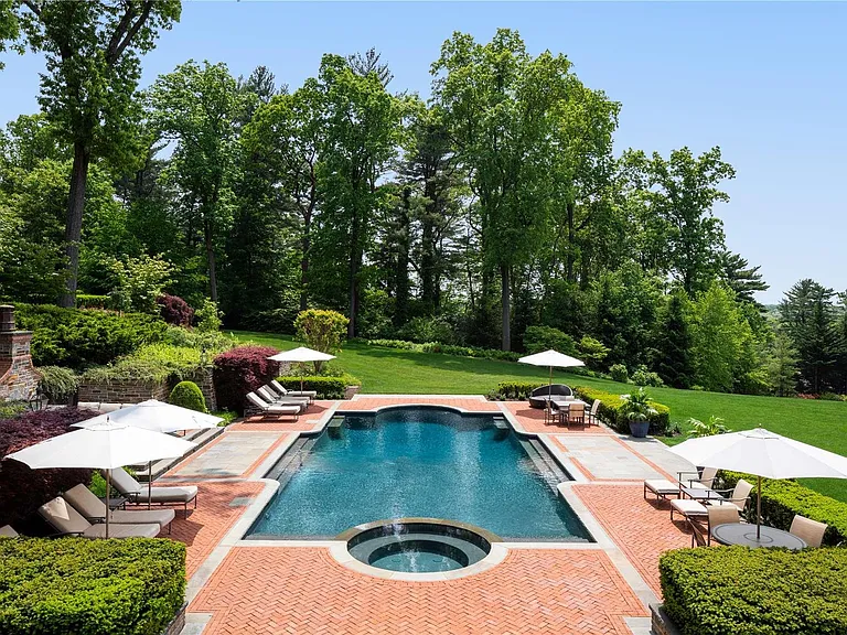 Old Westbury Mansion, exterior of Spring Hill Lane estate with in-ground pool