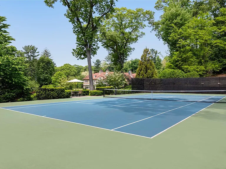 Old Westbury Mansion, exterior of Spring Hill Lane estate with private tennis courts