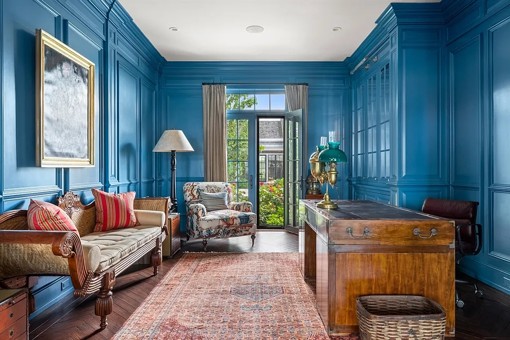 Most expensive house in Rhode Island, interior of 441 West Main Road in Little Compton with bold blue sitting room