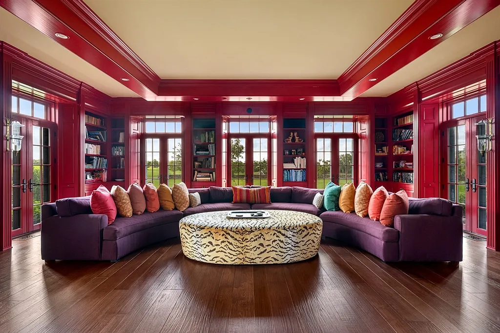 Most expensive house in Rhode Island, interior of 441 West Main Road in Little Compton with massive pruple and red living space overlooking the Atlantic Ocean