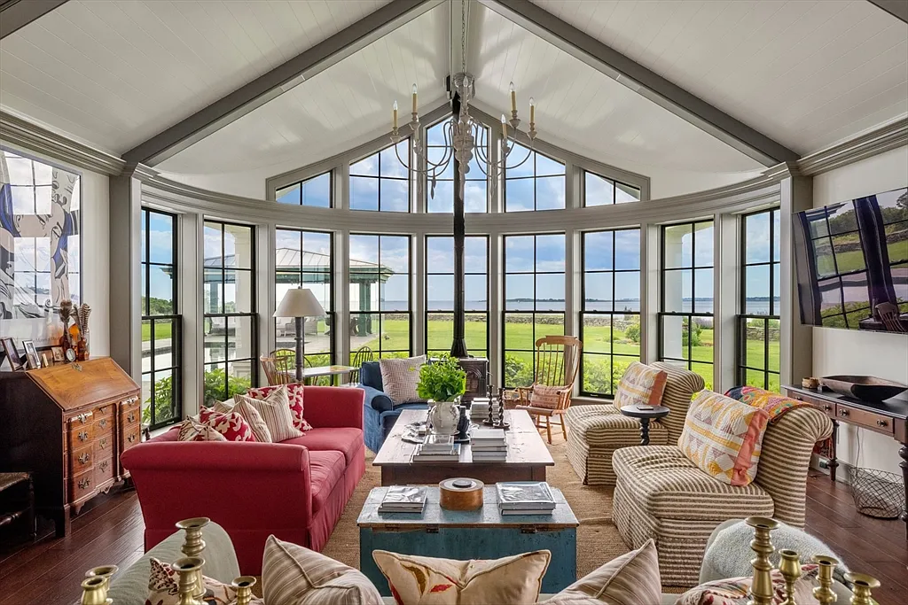 Most expensive house in Rhode Island, interior of 441 West Main Road in Little Compton with massive eat-in kitchen  and living space overlooking the Atlantic Ocean