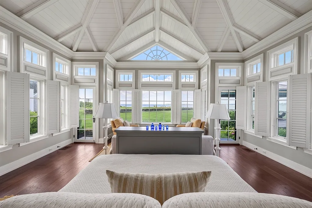 Most expensive house in Rhode Island, interior of 441 West Main Road in Little Compton with sun drenched master bedroom with vaulted ceilings overlooking the Atlantic Ocean