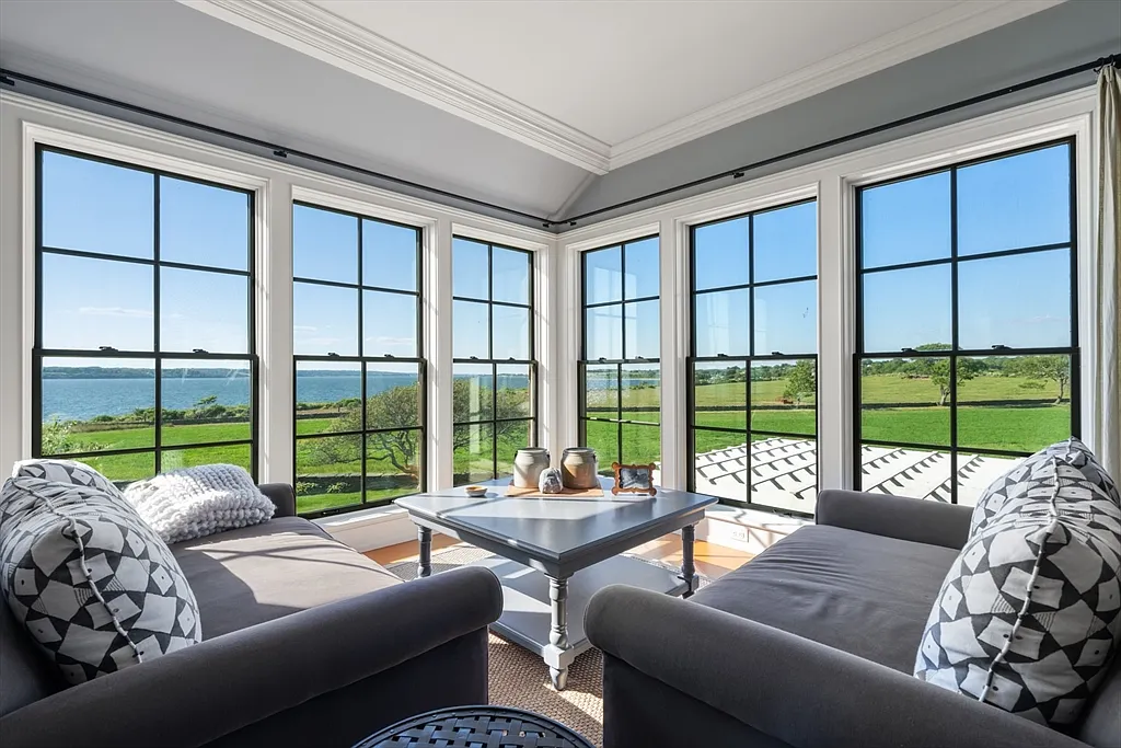 Most expensive house in Rhode Island, interior of 441 West Main Road in Little Compton with sun drenched master bedroom sitting area overlooking the Atlantic Ocean