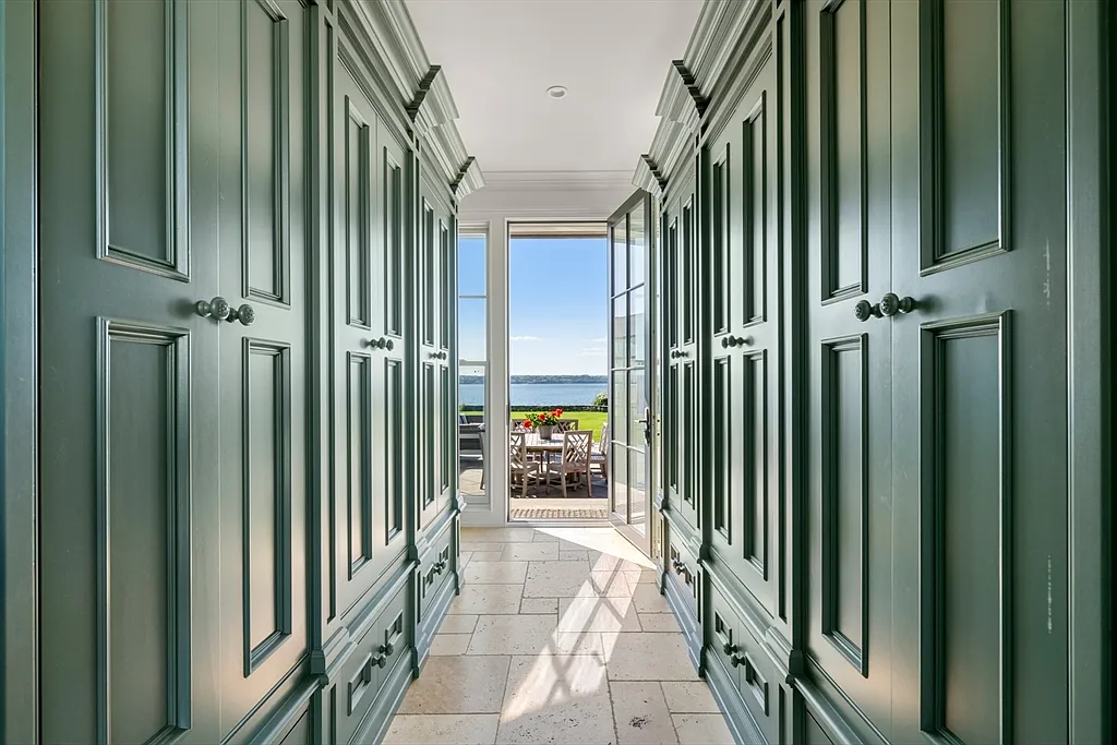 Most expensive house in Rhode Island, interior of 441 West Main Road in Little Compton with massive green cabinet corridor