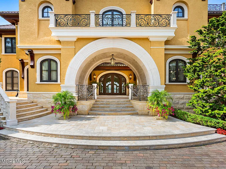 Massive Tuscan Palace in New Jersey on the Rumson and Navasink Rivers, exterior driveway and entrance with pavers