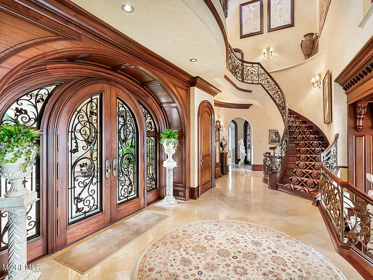 Massive Tuscan Palace in New Jersey on the Rumson and Navasink Rivers, interior two-story Tuscan tiled and wood foyer