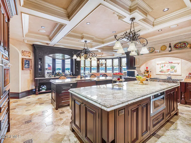 Massive Tuscan Palace in New Jersey on the Rumson and Navasink Rivers, modern tuscan kitchen with massive double marble islands