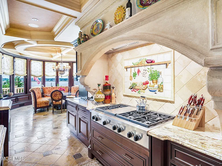 Massive Tuscan Palace in New Jersey on the Rumson and Navasink Rivers, modern tuscan kitchen with massive double marble islands