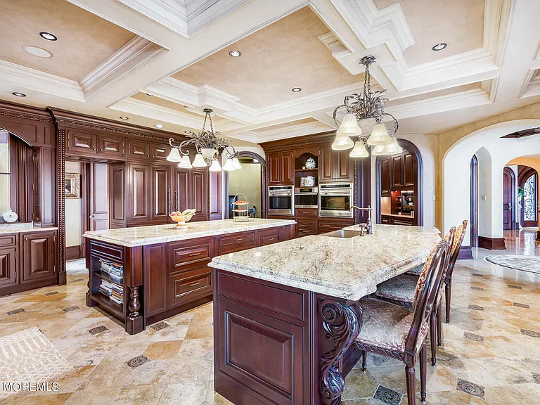 Massive Tuscan Palace in New Jersey on the Rumson and Navasink Rivers, modern tuscan kitchen with massive double marble islands