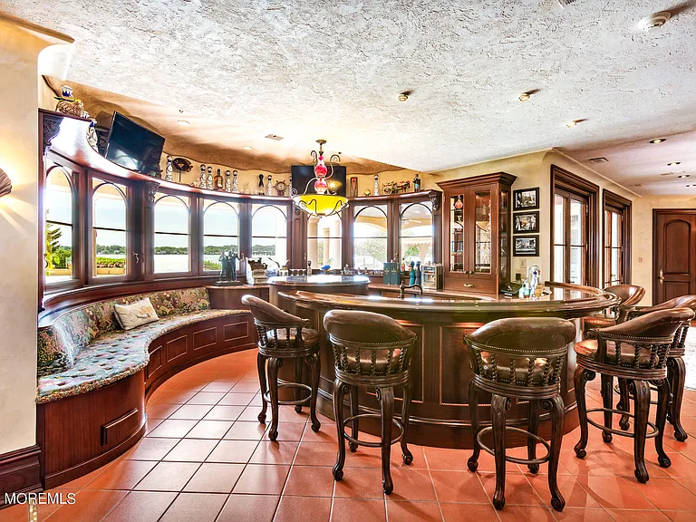 Massive Tuscan Palace in New Jersey on the Rumson and Navasink Rivers, massive home pub and entertaining zone