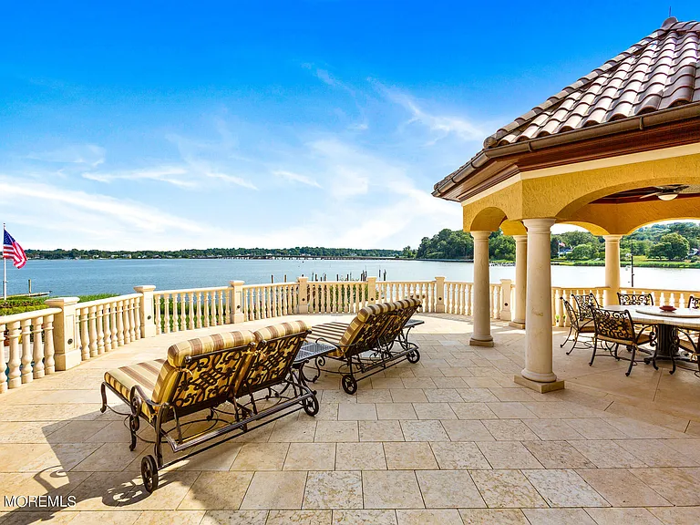 Massive Tuscan Palace in New Jersey on the Rumson and Navasink Rivers, exterior overlooking the riverfront and dock