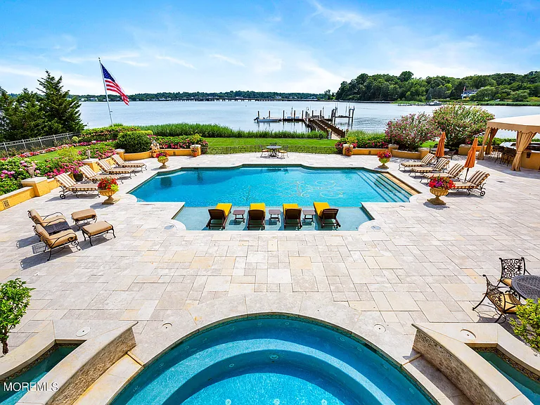 Massive Tuscan Palace in New Jersey on the Rumson and Navasink Rivers, exterior with 50,000 gallon in ground swimming pool