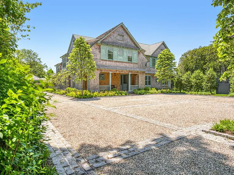 Old money Hamptons estate 134 Herrick Rd in Southampton New York, exterior with in-ground pool