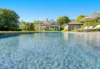 Old money Hamptons estate 134 Herrick Rd in Southampton New York, exterior with in-ground pool