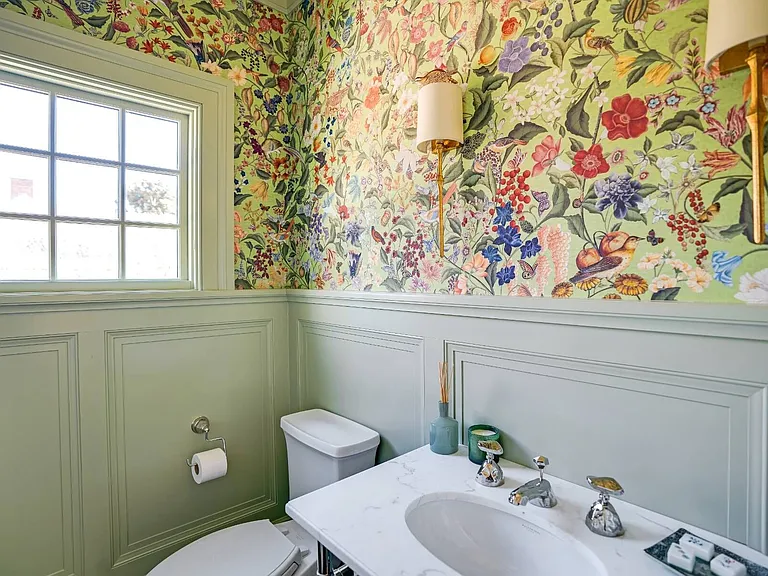 Old money Hamptons estate 134 Herrick Rd in Southampton New York, interior powder room bathroom with floral wallpaper