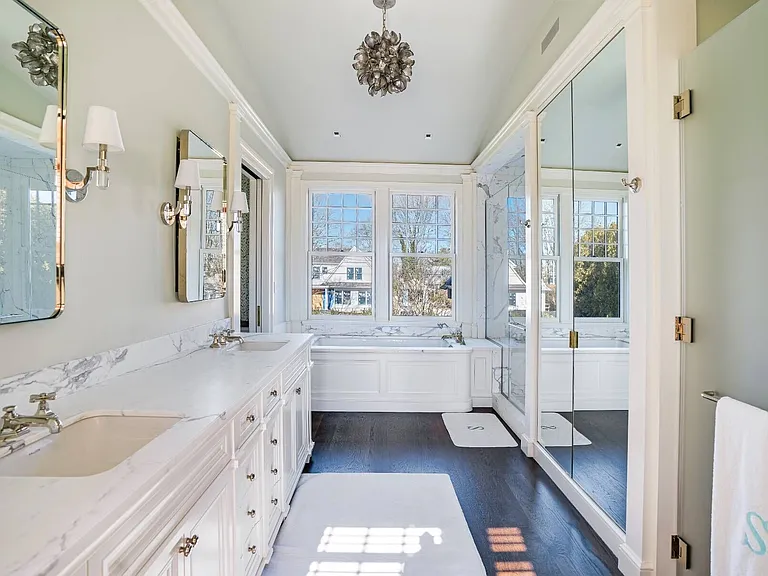 Old money Hamptons estate 134 Herrick Rd in Southampton New York, master bathroom with Italian marble