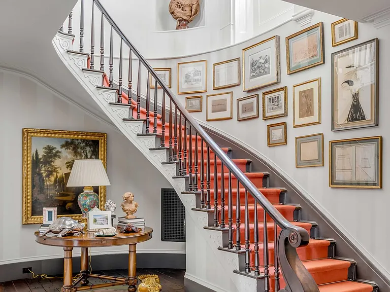 Scott Bessent's Charleston Waterfront Mansion, Italian-inspired grand foyer and curved staircase