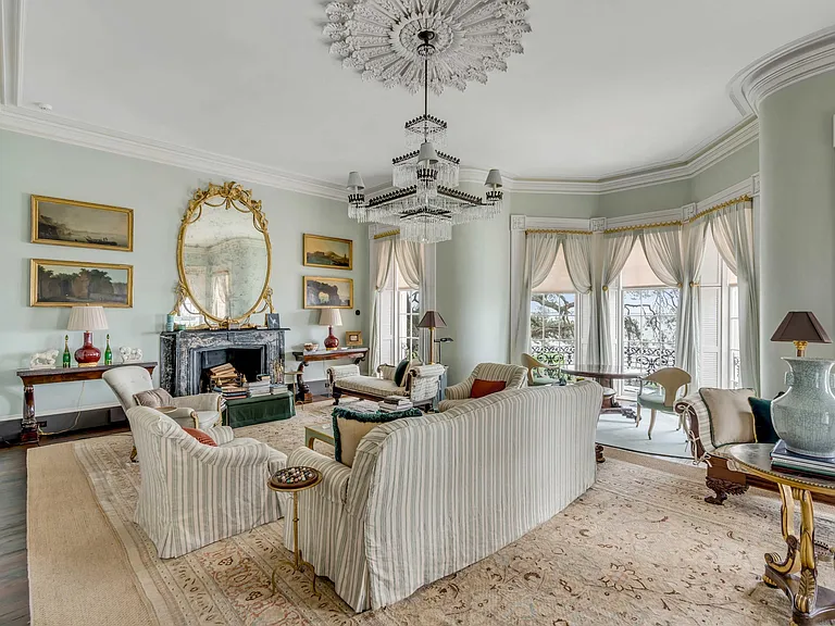 Scott Bessent's Charleston Waterfront Mansion, 1800s living room with medallion ceiling and atlantic views