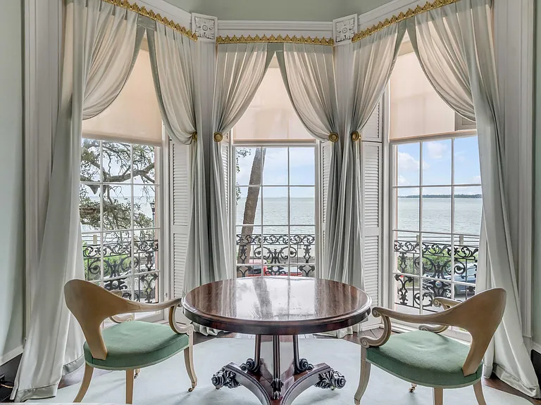 Scott Bessent's Charleston Waterfront Mansion, 1800s living room with medallion ceiling and atlantic views