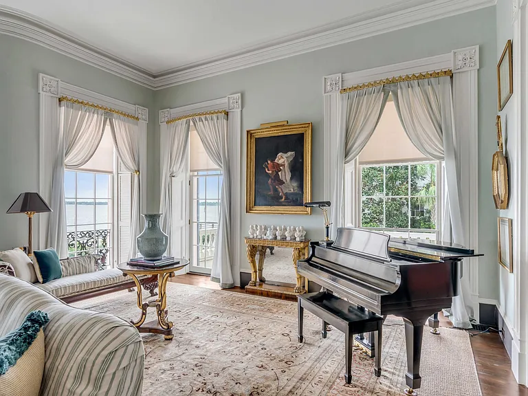 Scott Bessent's Charleston Waterfront Mansion, 1800s living room with medallion ceiling and atlantic views