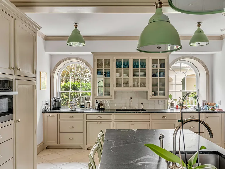 Scott Bessent's Charleston Waterfront Mansion, sage green and beige country kitchen