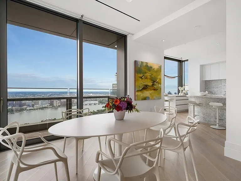 Boston's Most Expensive Penthouse Apartment, soft gray and white informal dining spaces