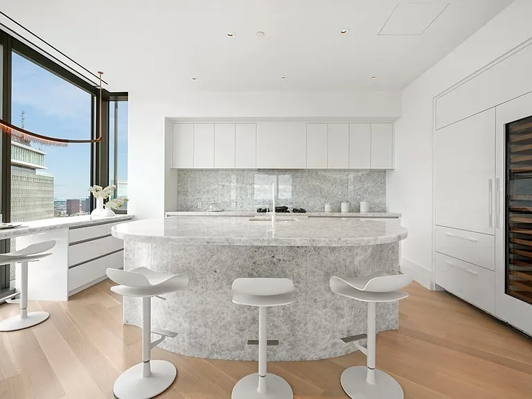 Boston's Most Expensive Penthouse Apartment, onyx kitchen in white and soft gray tones