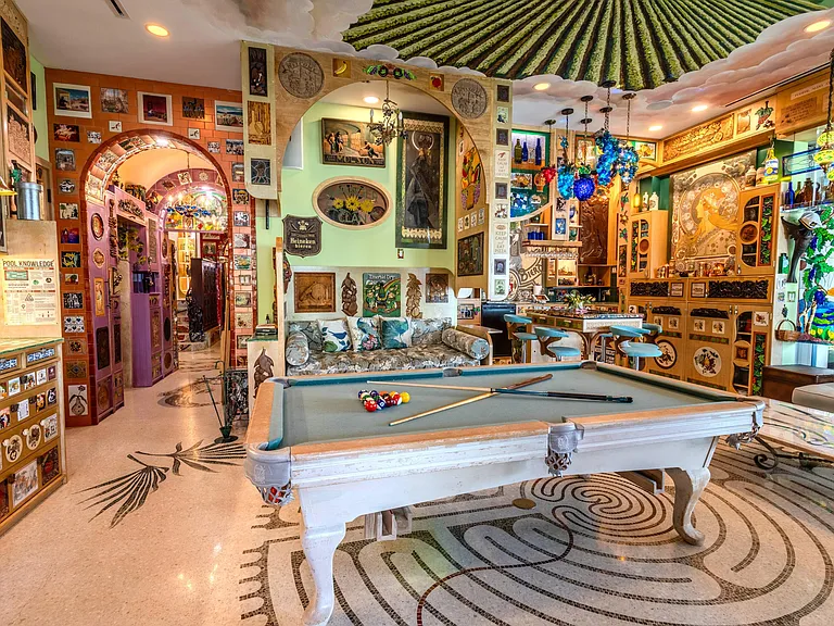 Crazy Florida mansion located at 1201 Marble Way in Boca Raton, la cornue kitchen with eclectic decor