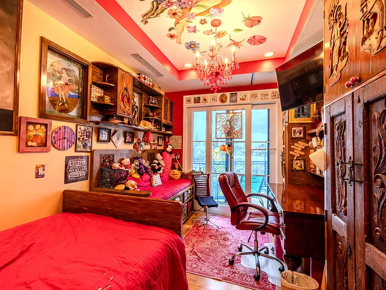 Crazy Florida mansion located at 1201 Marble Way in Boca Raton, interior red themed bedroom with eclectic decor