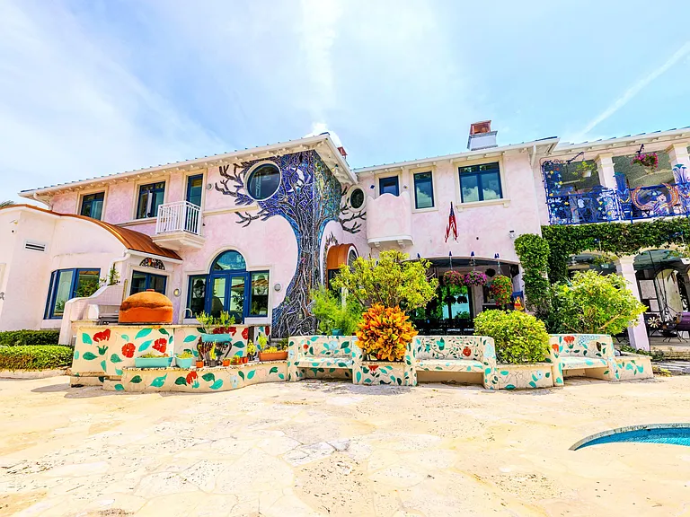 Crazy Florida mansion located at 1201 Marble Way in Boca Raton, exterior image with tile mosaic stucco walls