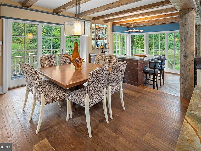 1700s equestrian estate in Lower Gwynedd Pennsylvania, colonial era   dining room with modern eat-in tables