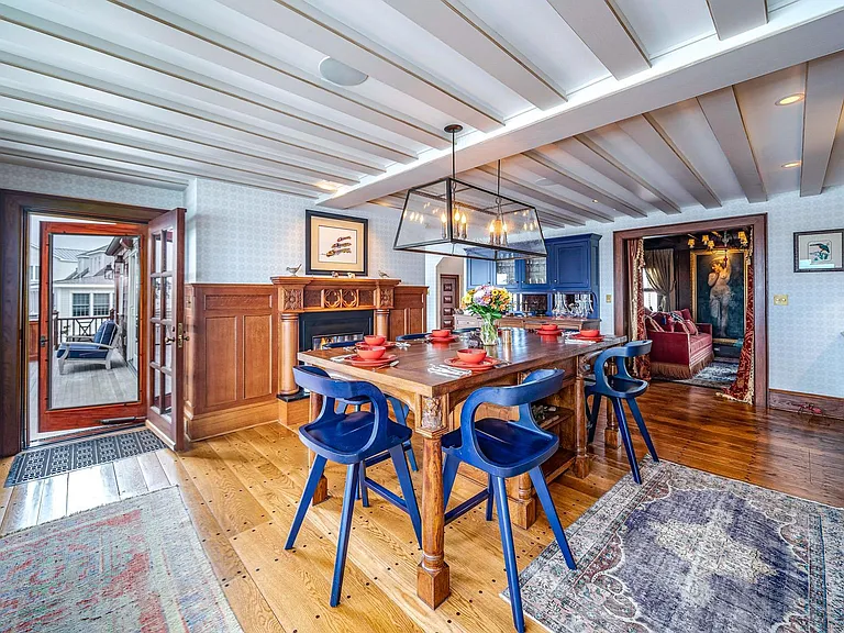 Timeless NJ bayfront beach house, rustic interior kitchen with seaviews of 612 S Bayview Drive in Strathmere, New Jersey with exposed wood beams