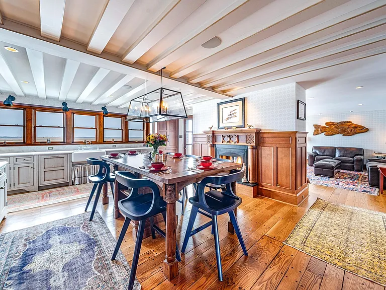 Timeless NJ bayfront beach house, rustic interior kitchen with seaviews of 612 S Bayview Drive in Strathmere, New Jersey with exposed wood beams