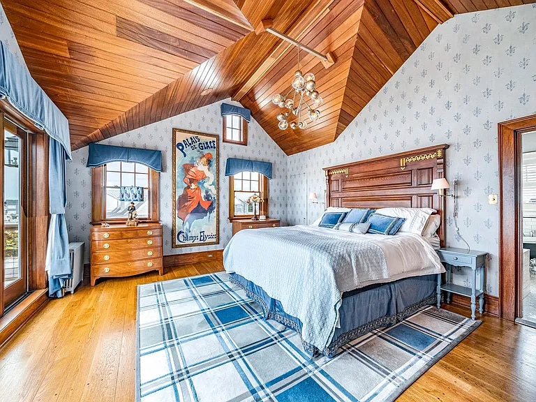 Timeless NJ bayfront beach house, master bedroom with vaulted mahogony ceilings of 612 S Bayview Drive in Strathmere, New Jersey