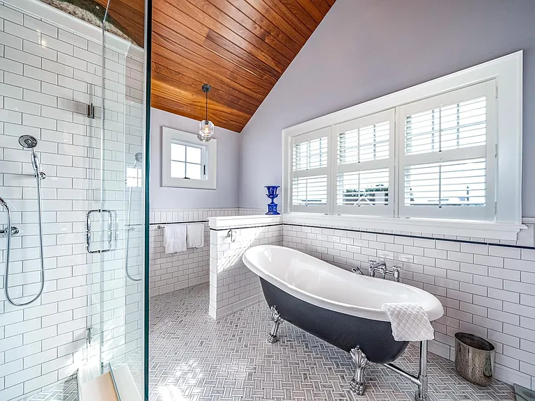 Timeless NJ bayfront beach house, master bathroom with vaulted mahogony ceilings of 612 S Bayview Drive in Strathmere, New Jersey