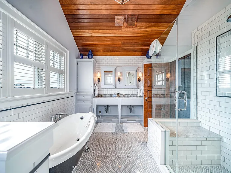 Timeless NJ bayfront beach house, master bathroom with vaulted mahogony ceilings of 612 S Bayview Drive in Strathmere, New Jersey