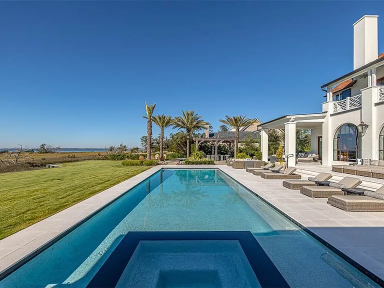 Most beautiful mansion on Saint Simons Island, Georgia, exterior in-ground pool facing Jekyll Island