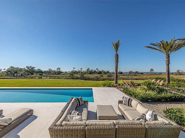 Most beautiful mansion on Saint Simons Island, Georgia, exterior view of Jekyll Island and in-ground pool