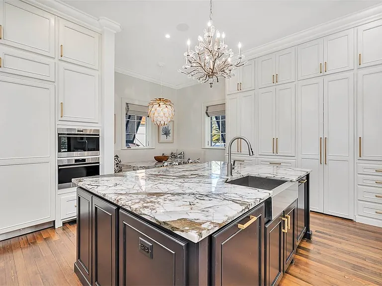 Most beautiful mansion on Saint Simons Island, Georgia, black white and gold quartzite kitchen