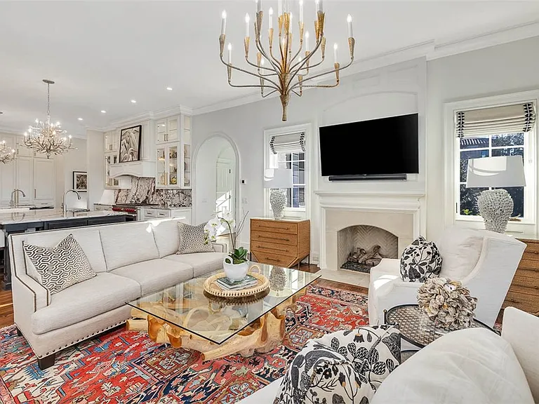 Most beautiful mansion on Saint Simons Island, Georgia, white red and gold living room with natural wood finishes