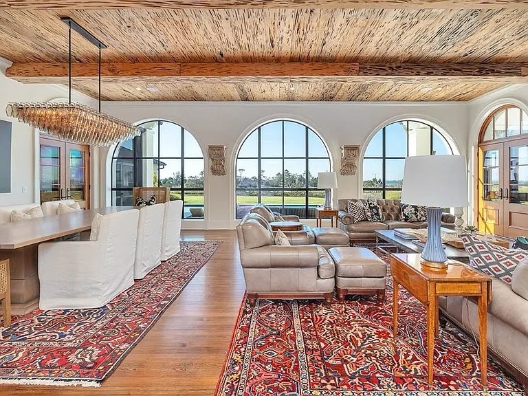 Most beautiful mansion on Saint Simons Island, Georgia, massive interior dining room with sea views and exposed wood beams