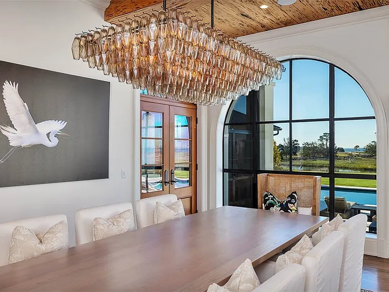 Most beautiful mansion on Saint Simons Island, Georgia, massive interior dining room with sea views and exposed wood beams