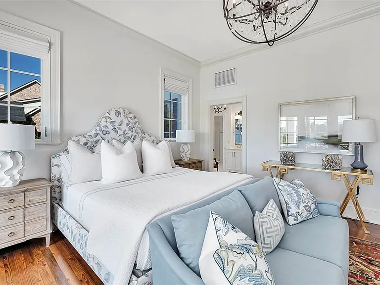 Most beautiful mansion on Saint Simons Island, Georgia, blue and white guest bedroom with modern decor and views of Jekyll Island