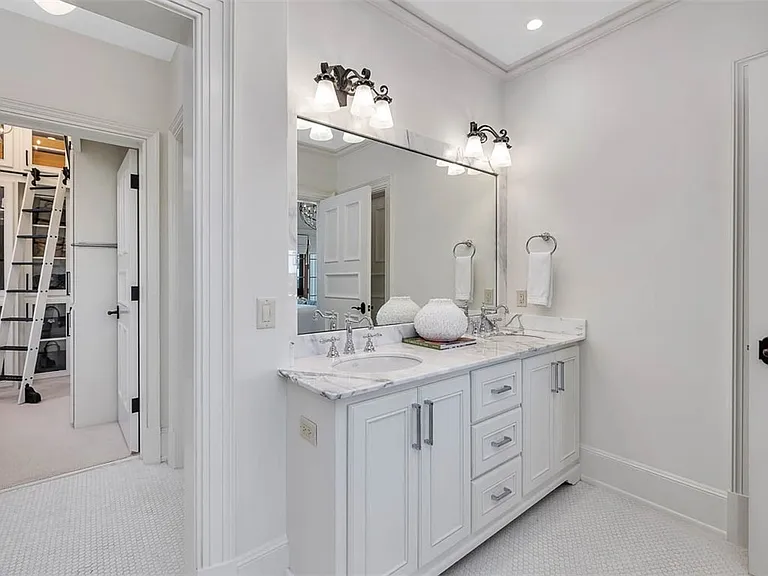 Most beautiful mansion on Saint Simons Island, Georgia, gray and white guest bathroom with modern decor and views of Jekyll Island