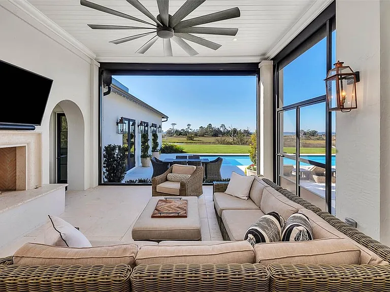 Most beautiful mansion on Saint Simons Island, Georgia, screened in living room porch overlooking Jekyll Island