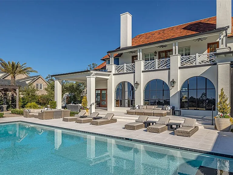 Most beautiful mansion on Saint Simons Island, Georgia, exterior with in-ground pool and patio area