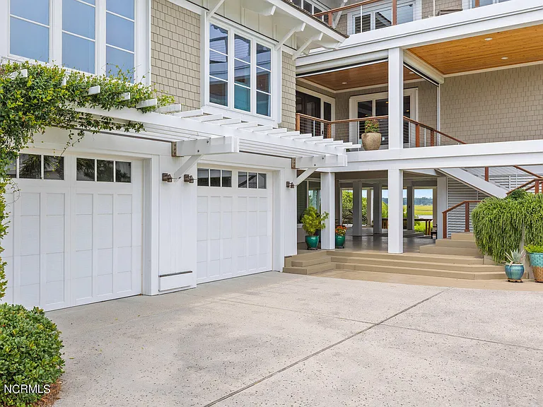 Wilmington Beach Mansion with Panoramic Views, driveway with two car garage and exterior view